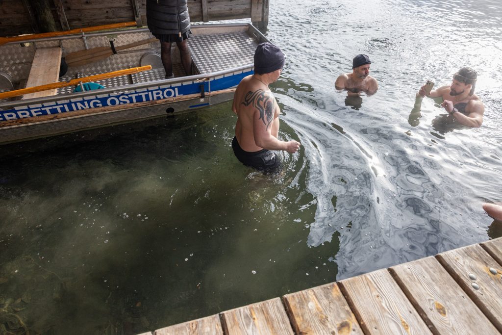 Preparing and entering the ice cold water!