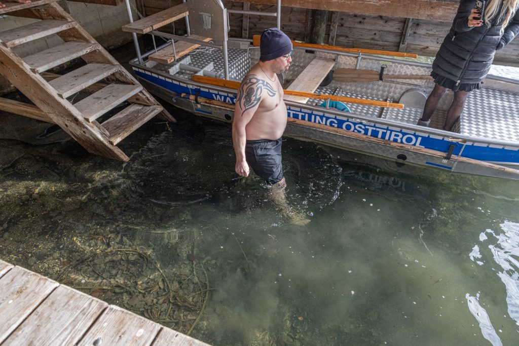 Preparing and entering the ice cold water!